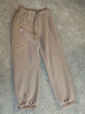 Sweatpants with heart patches